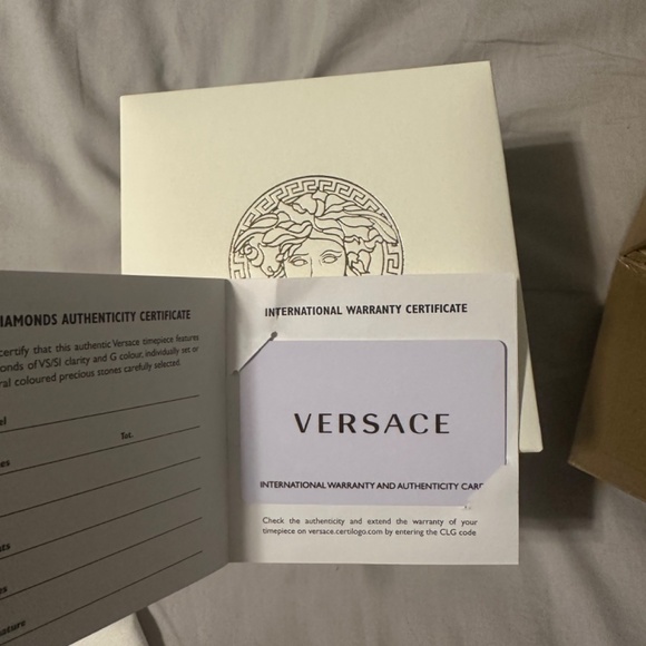 Gold and silver (band) Authentic Versace watch